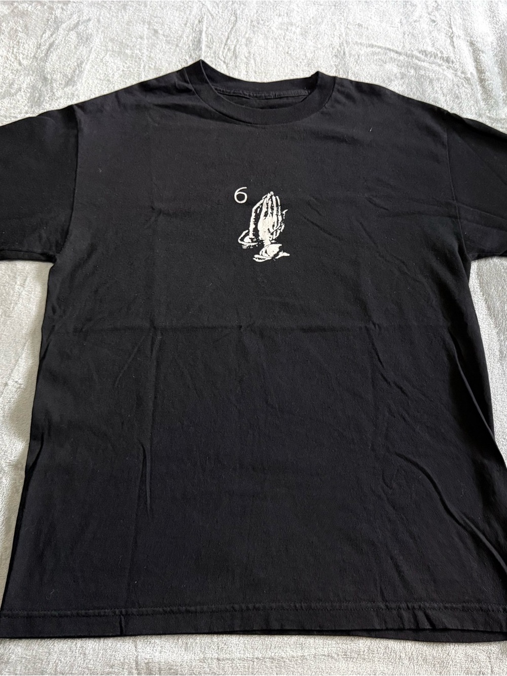 Black Short-Sleeve Tee with Prayer Hands Graphic